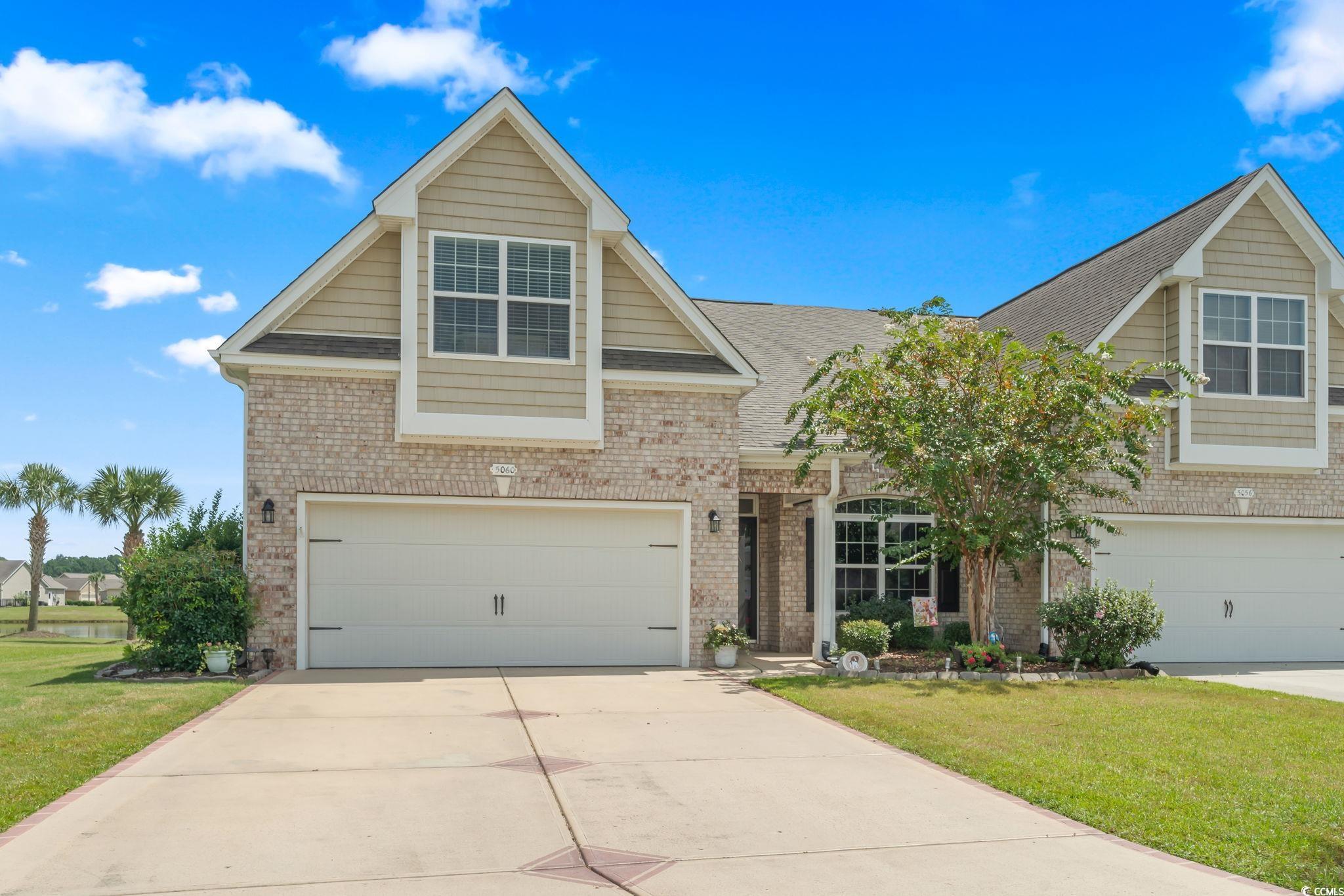 5060 Prato Loop Myrtle Beach, SC 29579 - Photo 1 of 40 View of front of house with a garage and a front l