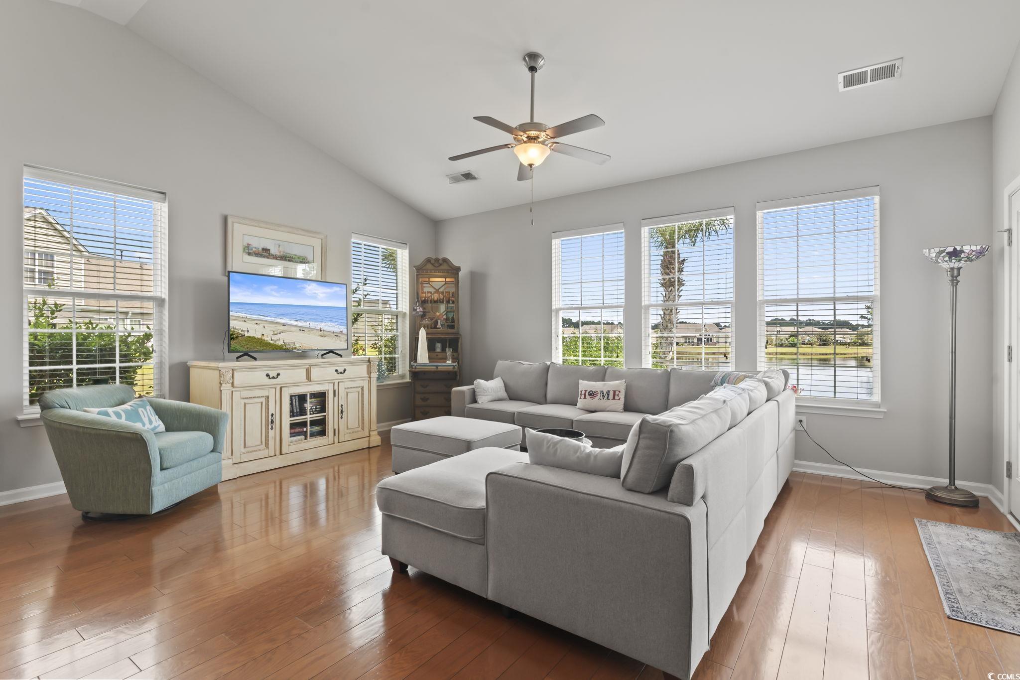 5060 Prato Loop Myrtle Beach, SC 29579 - Photo 16 of 40 Living room featuring lofted ceiling, hardwood / w