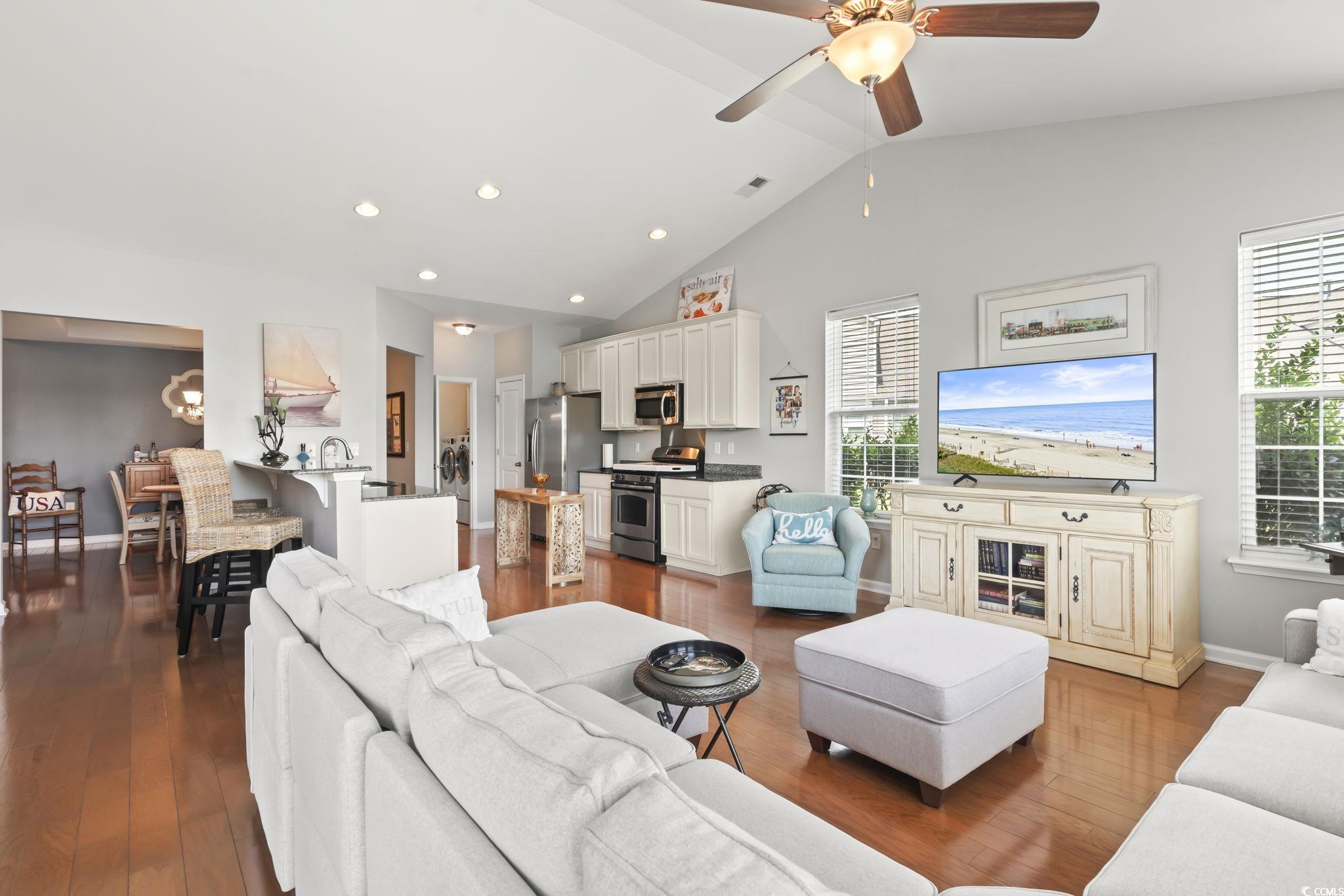 5060 Prato Loop Myrtle Beach, SC 29579 - Photo 18 of 40 Living room with vaulted ceiling, a wealth of natu