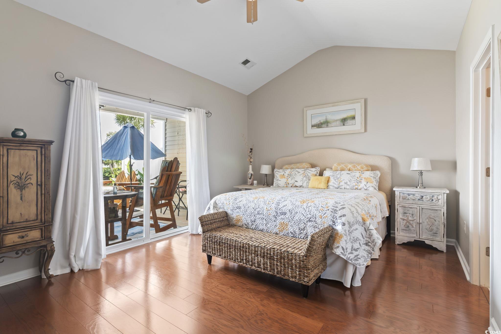 5060 Prato Loop Myrtle Beach, SC 29579 - Photo 19 of 40 Bedroom featuring lofted ceiling, access to exteri