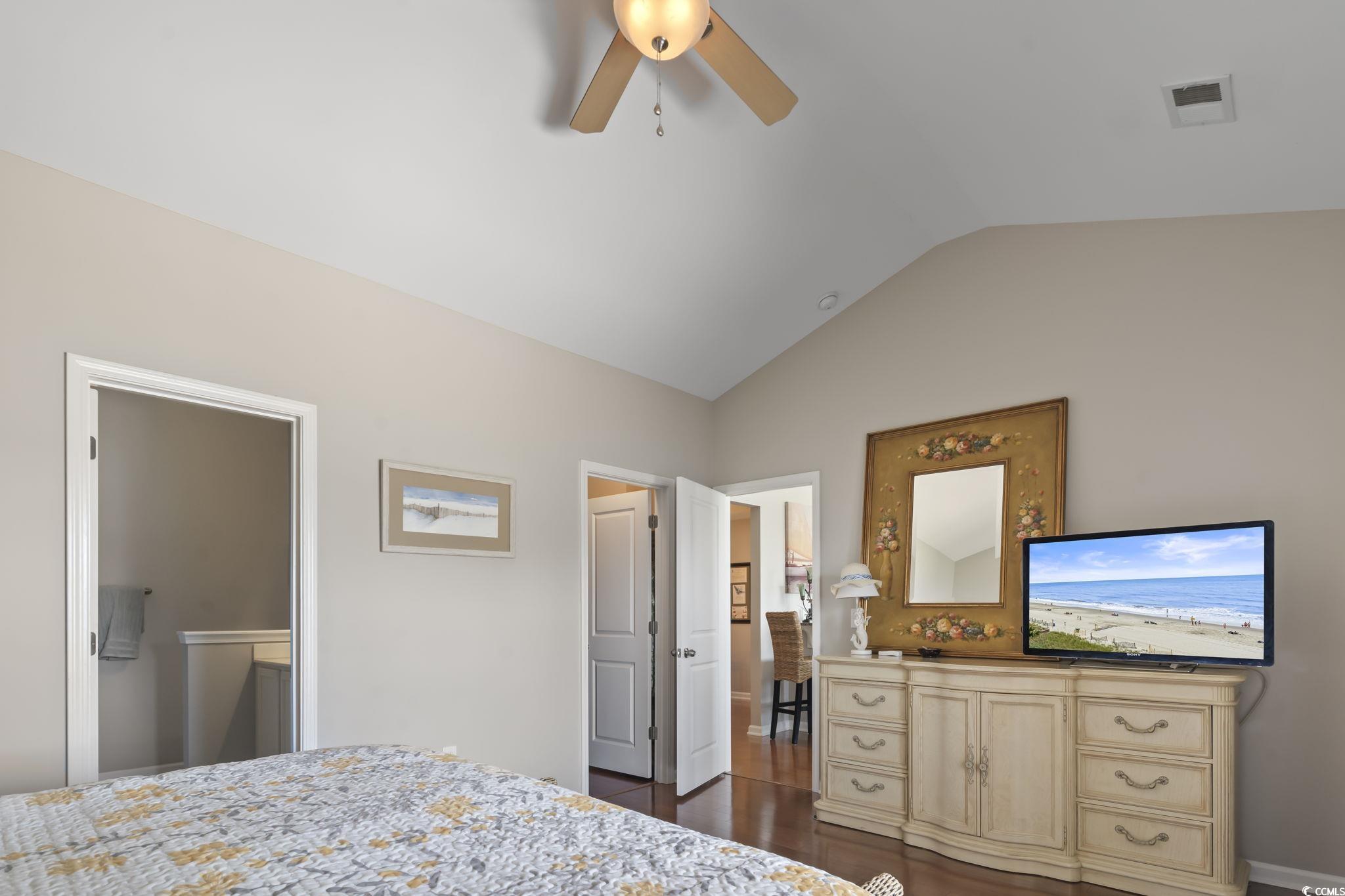 5060 Prato Loop Myrtle Beach, SC 29579 - Photo 20 of 40 Bedroom with vaulted ceiling, ceiling fan, and dar