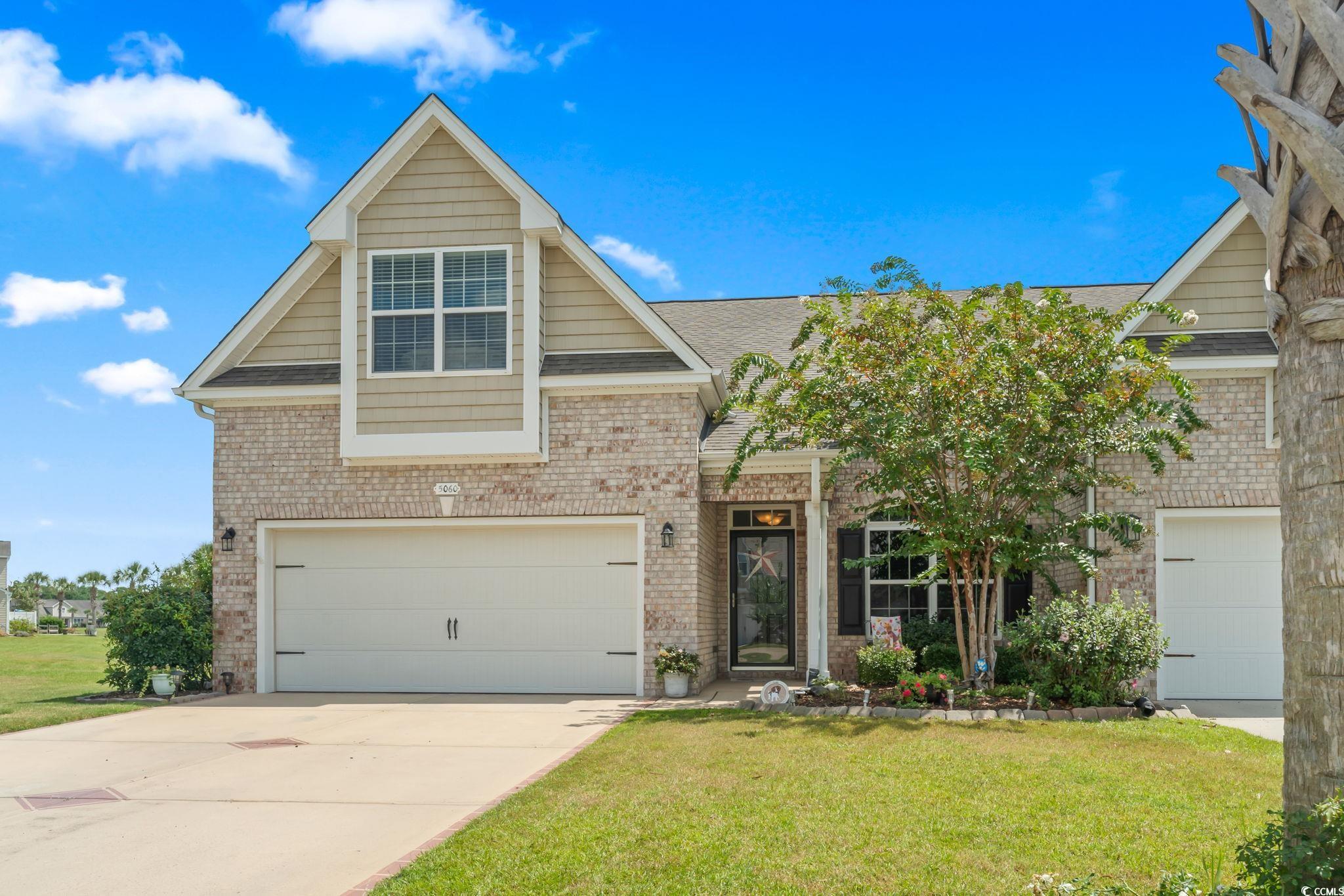 5060 Prato Loop Myrtle Beach, SC 29579 - Photo 2 of 40 View of front of property featuring a garage and a
