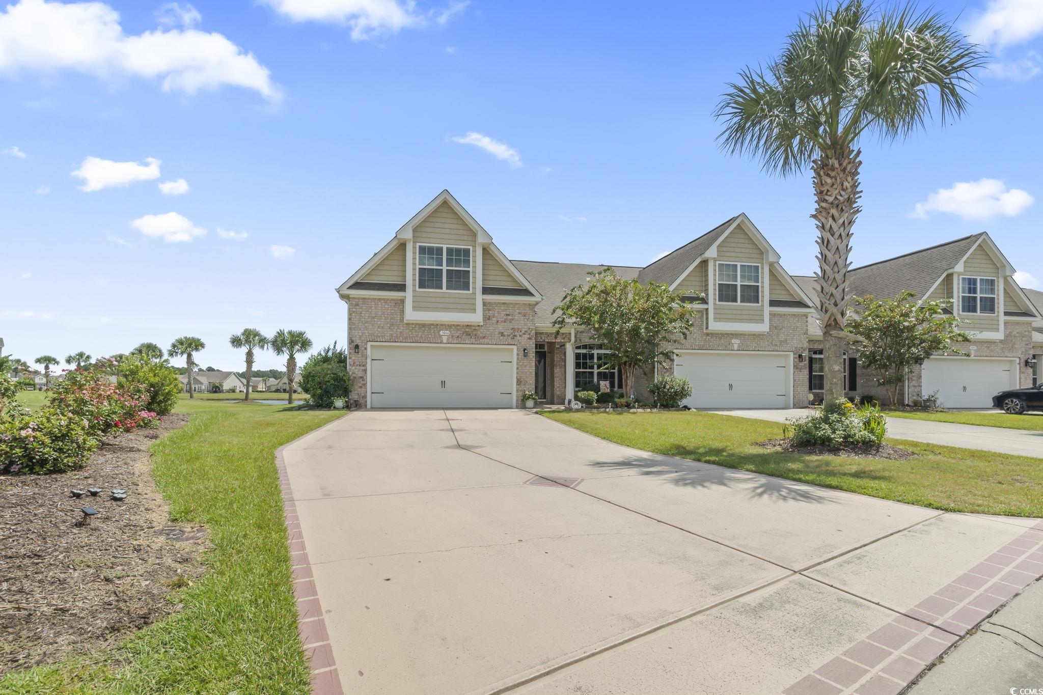 5060 Prato Loop Myrtle Beach, SC 29579 - Photo 3 of 40 View of front of property with a garage and a fron