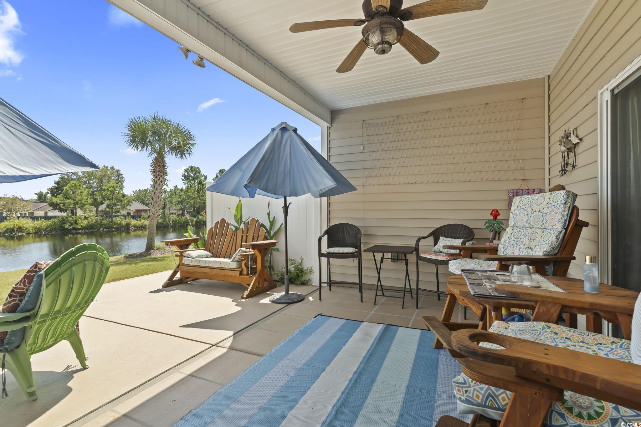 5060 Prato Loop Myrtle Beach, SC 29579 - Photo 32 of 40 View of patio / terrace featuring a water view and