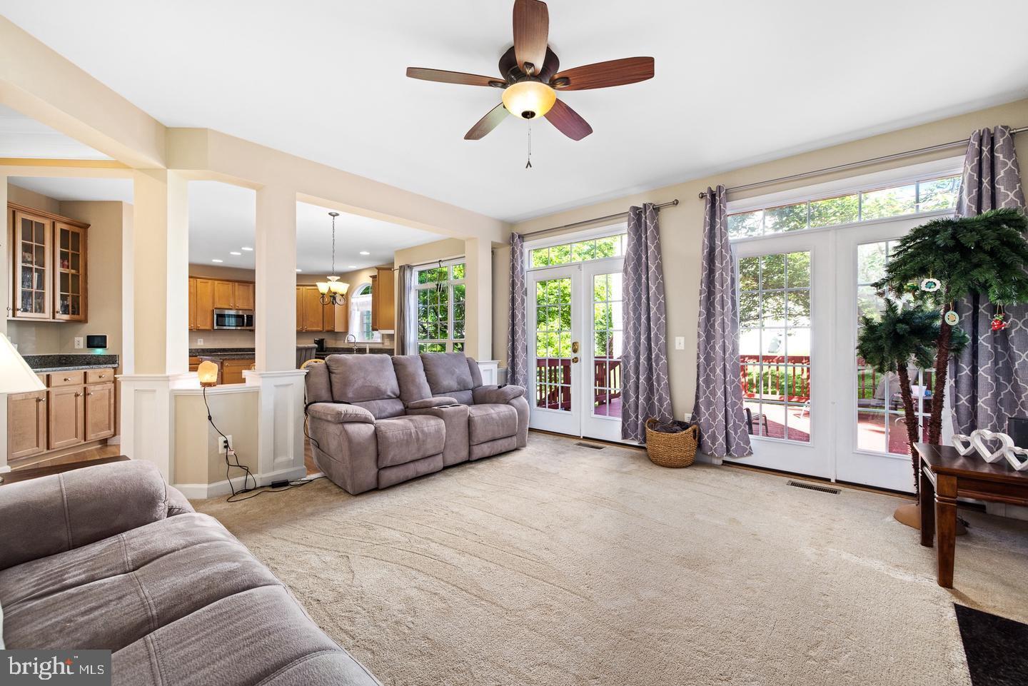 3314 Lady Catherine Circle Triangle, VA 22172 - Photo 10 of 33 French Doors and Transom Windows Frame Backyard