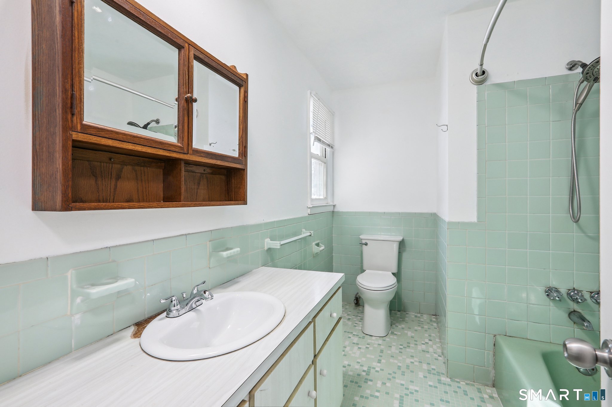 643 Bucks Hill Road Southbury, CT 06488 - Photo 12 of 25 a bathroom with a sink a toilet and mirror