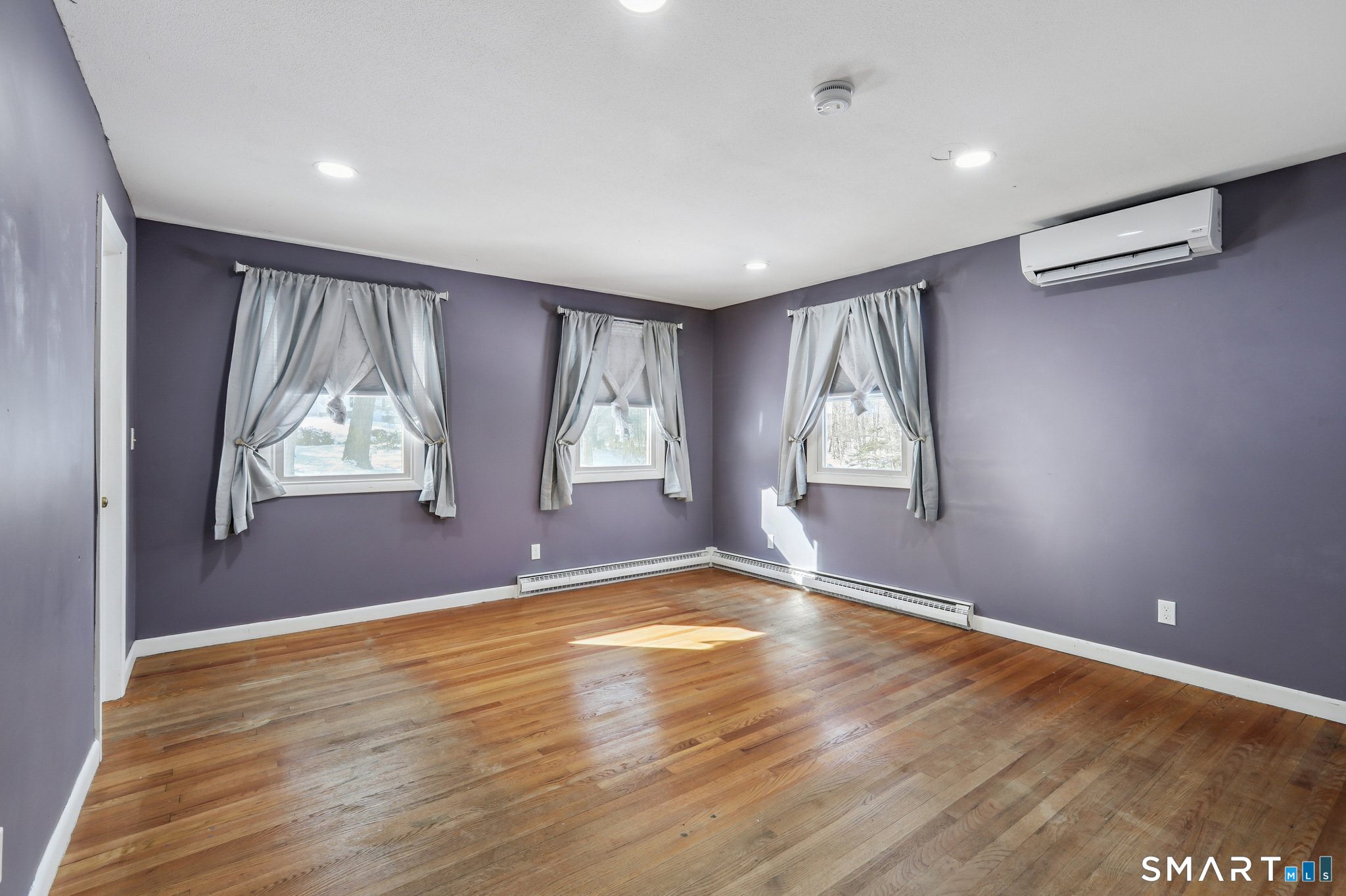 643 Bucks Hill Road Southbury, CT 06488 - Photo 15 of 25 wooden floor in an empty room with a window