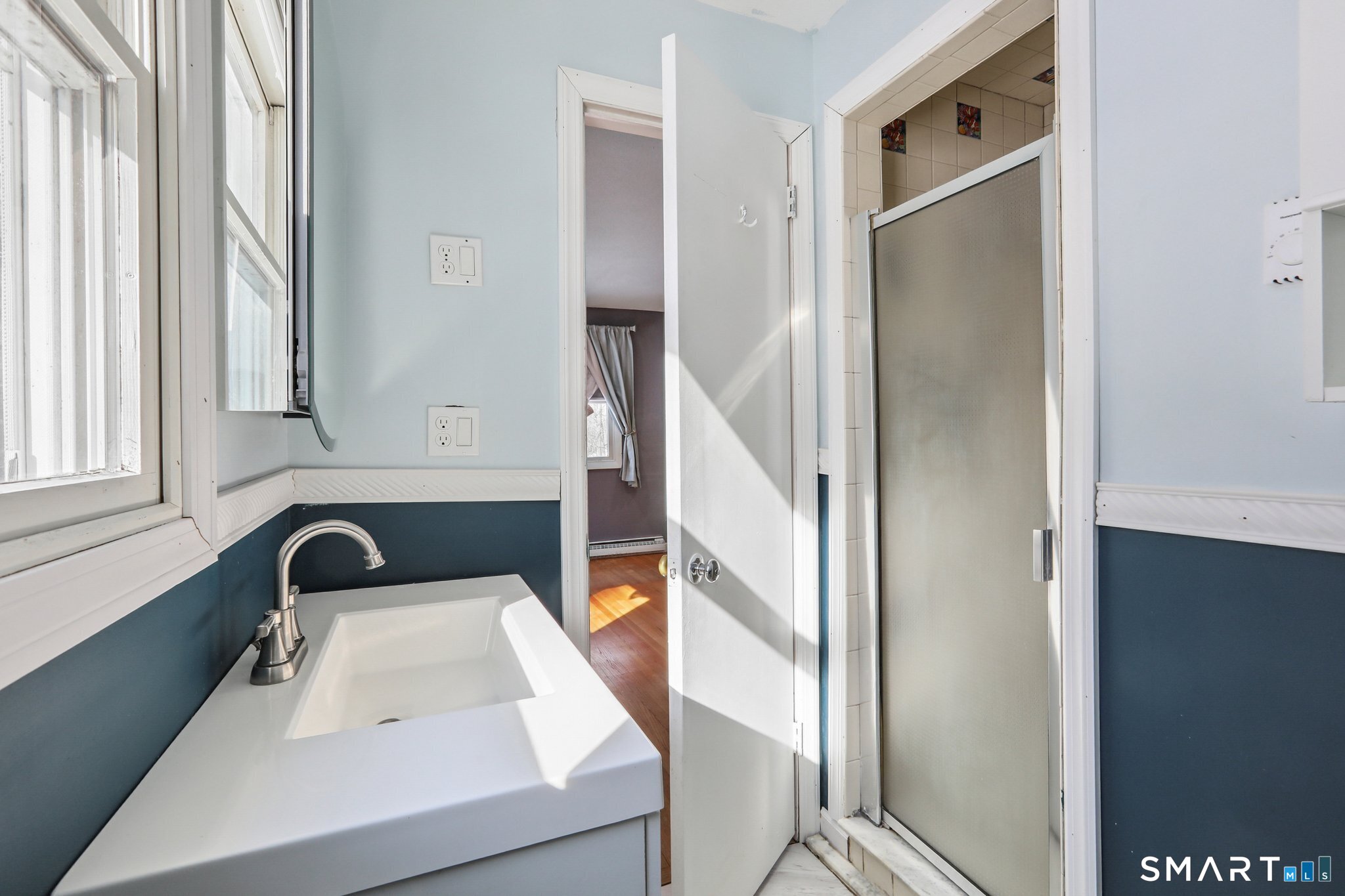 643 Bucks Hill Road Southbury, CT 06488 - Photo 18 of 25 a bathroom with a sink and a mirror