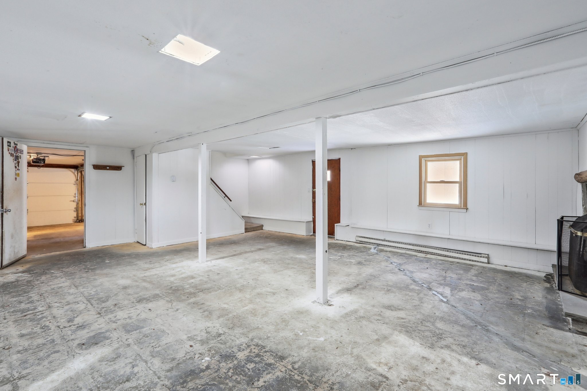 643 Bucks Hill Road Southbury, CT 06488 - Photo 20 of 25 a view of an empty room and a window
