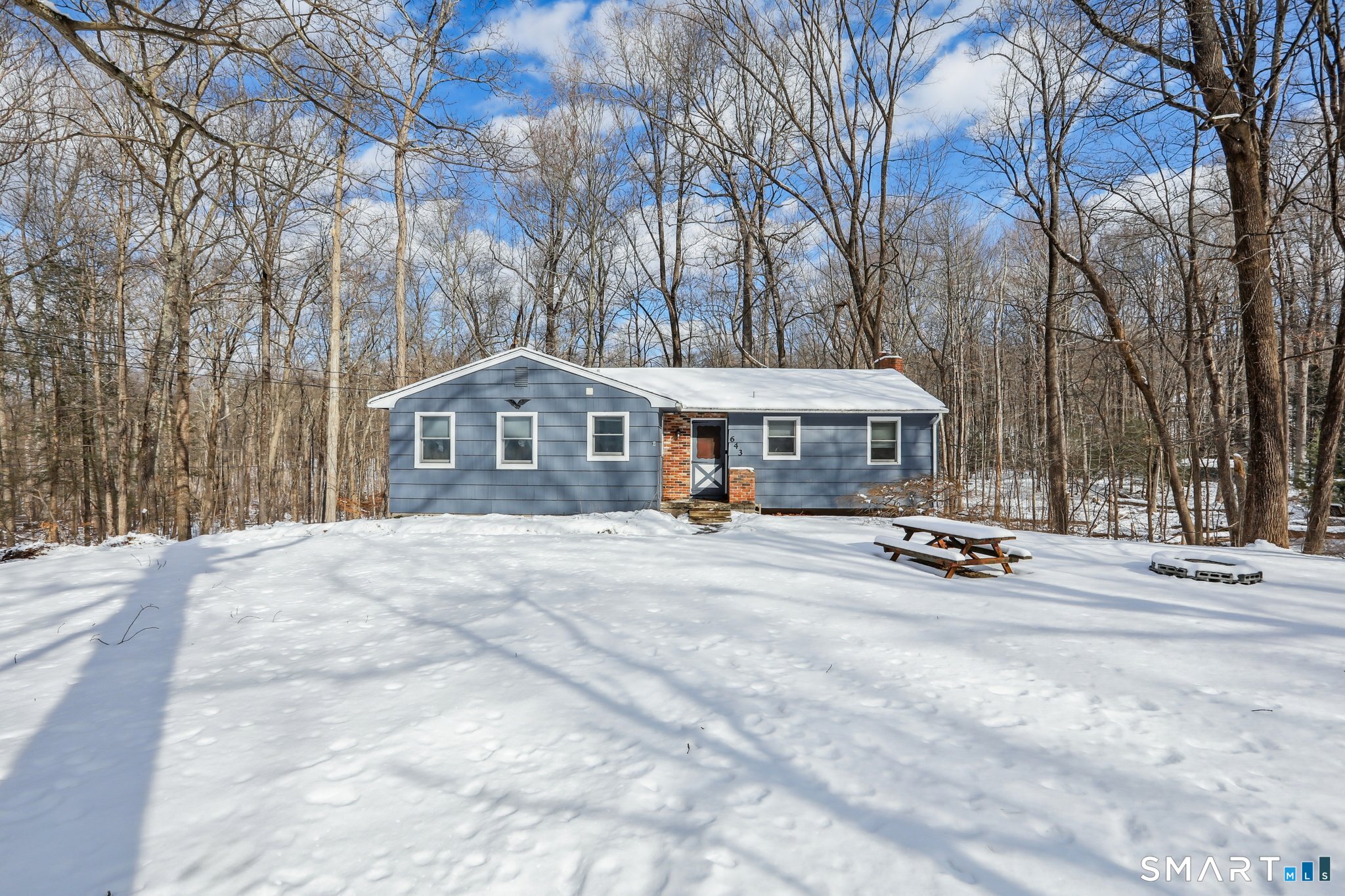 643 Bucks Hill Road Southbury, CT 06488 - Photo 23 of 25 a view of a house with cars parked beside of it