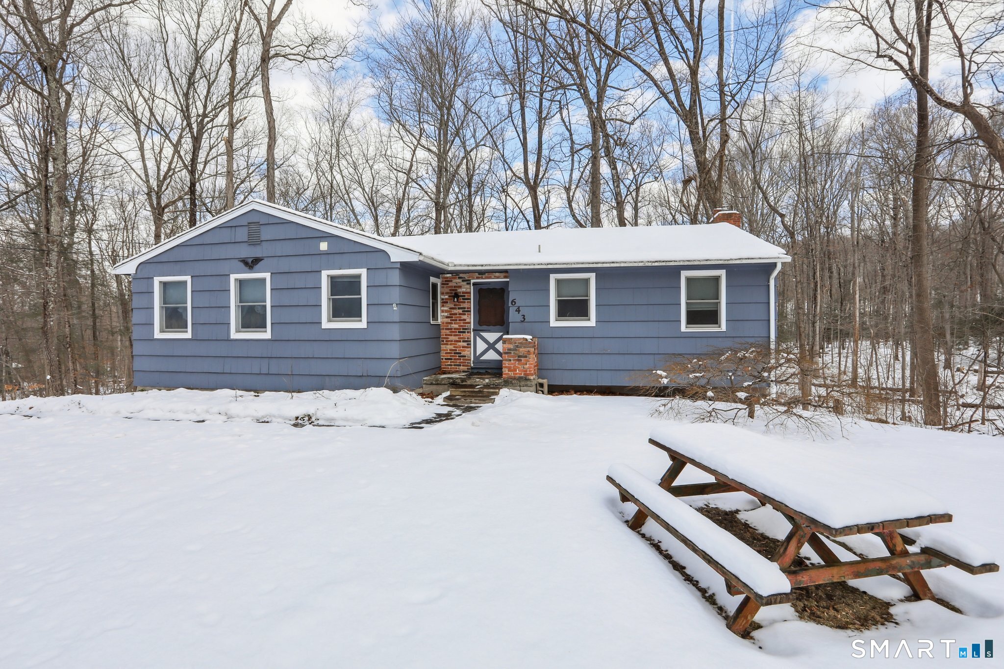 643 Bucks Hill Road Southbury, CT 06488 - Photo 24 of 25 a view of a house with yard and chairs