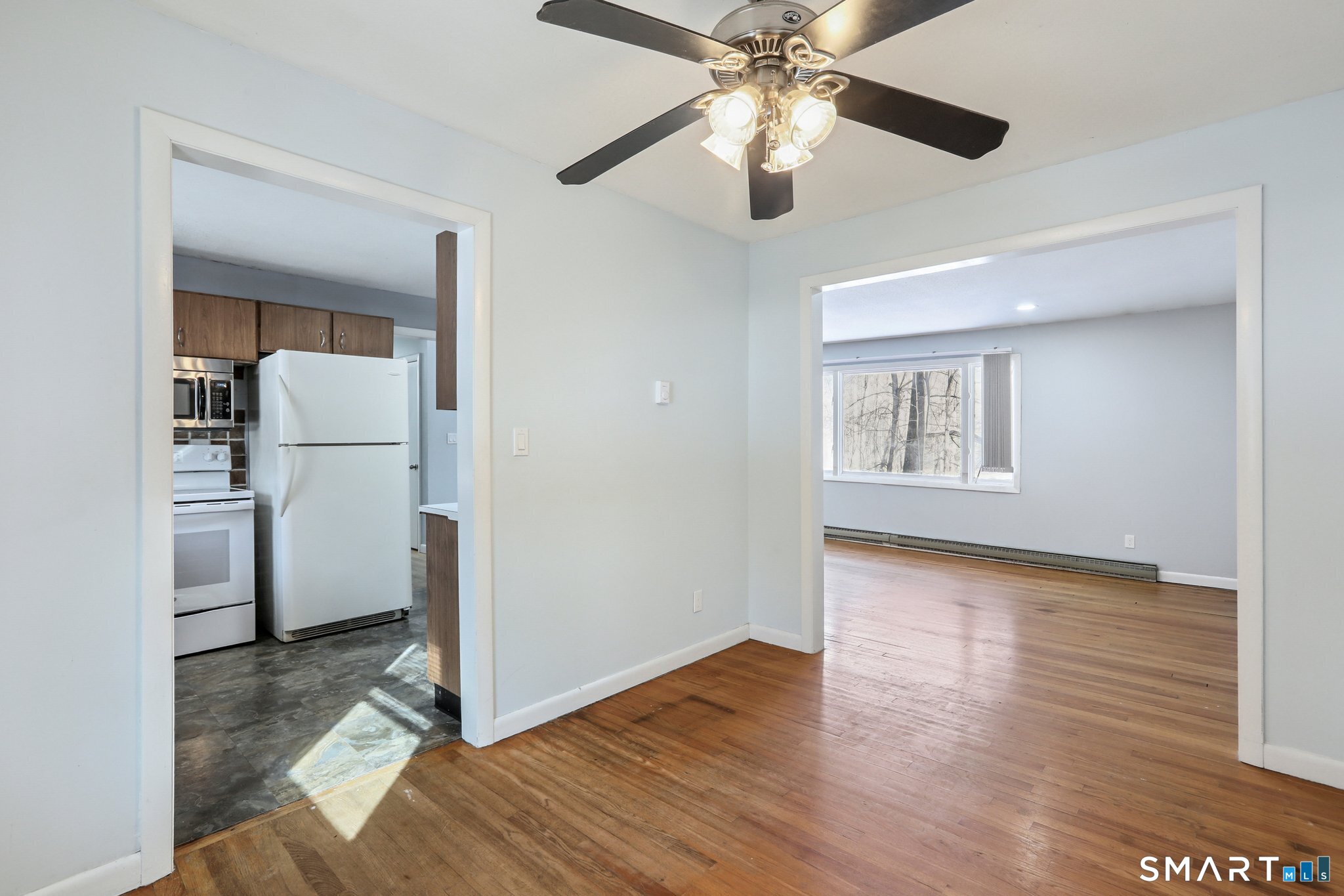 643 Bucks Hill Road Southbury, CT 06488 - Photo 7 of 25 wooden floor in an empty room with a window