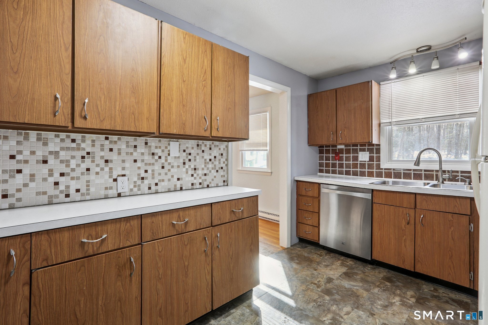 643 Bucks Hill Road Southbury, CT 06488 - Photo 10 of 25 a kitchen with a sink and cabinets