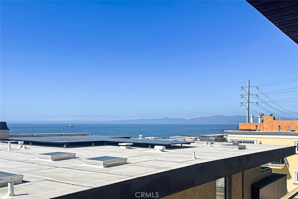 4321 Crest Drive Manhattan Beach, CA 90266 - Photo 11 of 37 a view of a kitchen with stainless steel appliances and cabinets