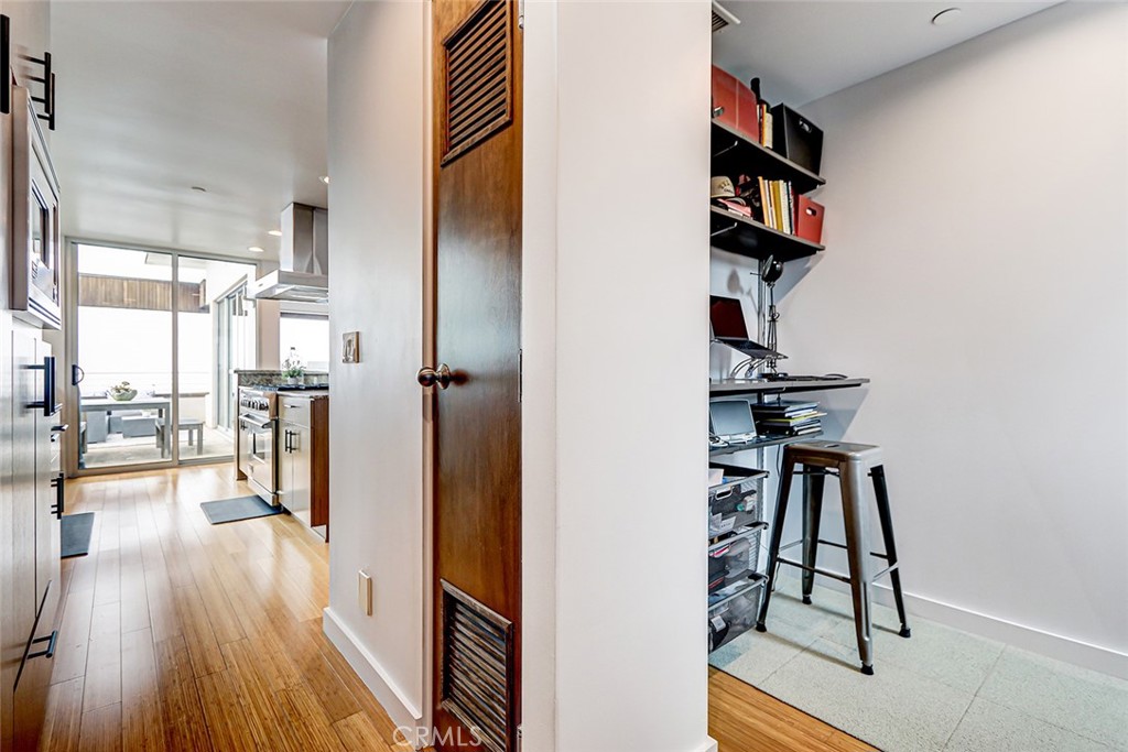 4321 Crest Drive Manhattan Beach, CA 90266 - Photo 21 of 37 a view of a room with gym equipment and a window