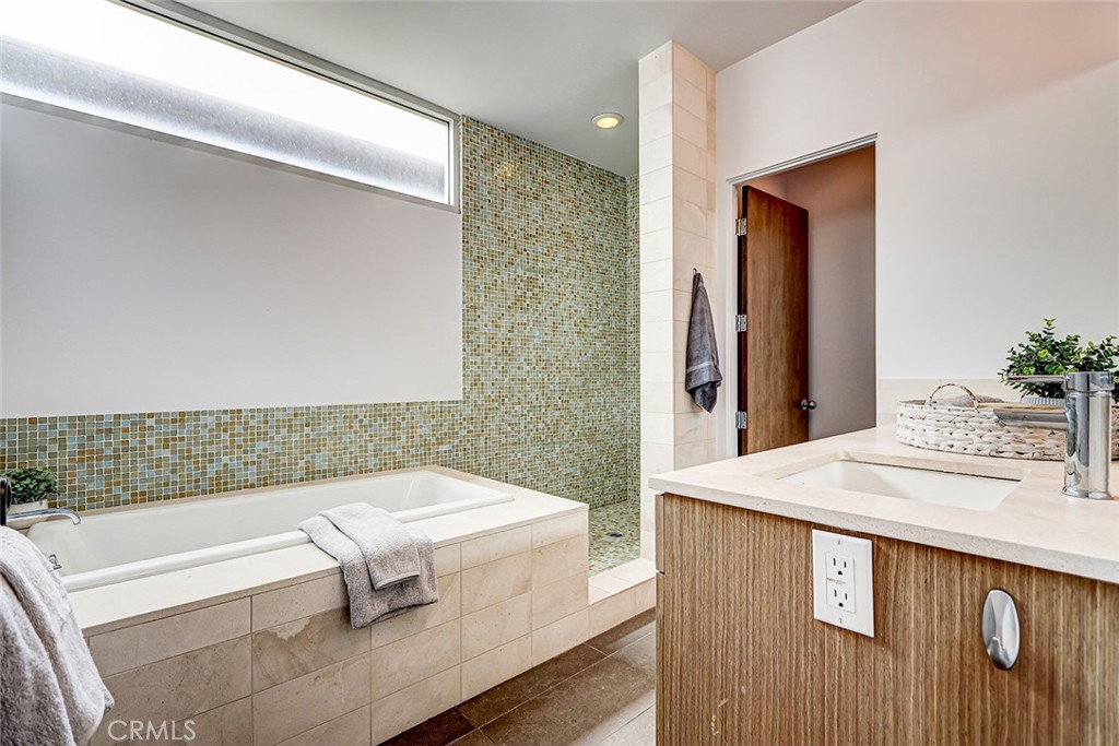 4321 Crest Drive Manhattan Beach, CA 90266 - Photo 30 of 37 a bathroom with a sink and a mirror