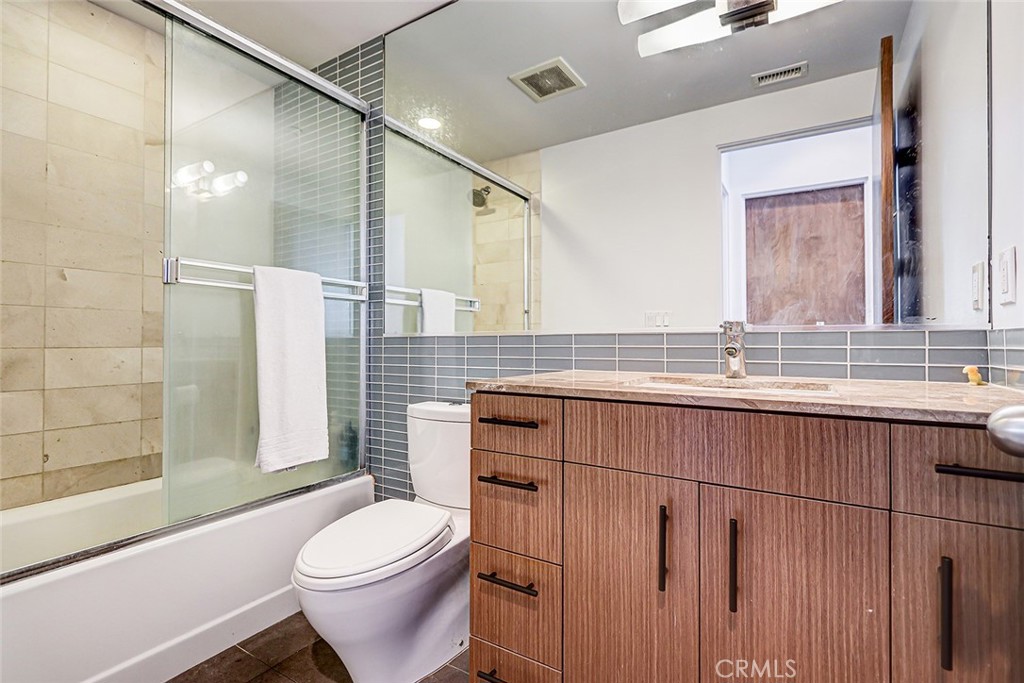 4321 Crest Drive Manhattan Beach, CA 90266 - Photo 34 of 37 a bathroom with a sink a toilet and shower