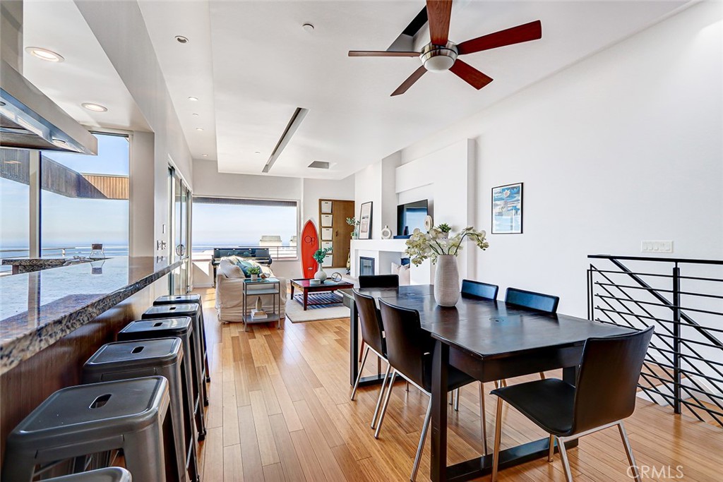 4321 Crest Drive Manhattan Beach, CA 90266 - Photo 6 of 37 a view of a dining room with furniture and wooden floor