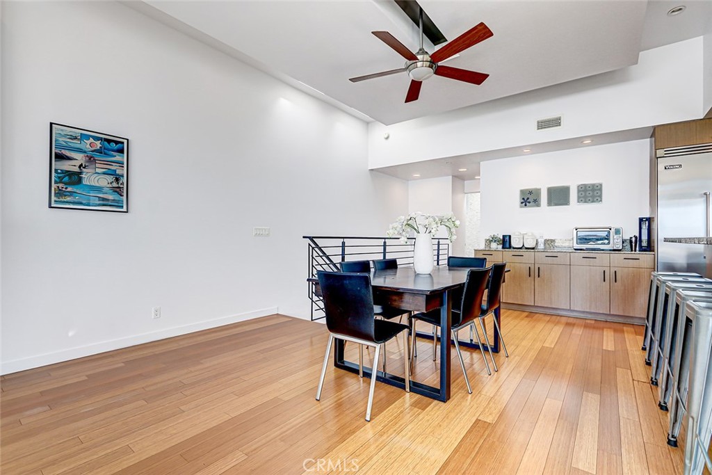4321 Crest Drive Manhattan Beach, CA 90266 - Photo 7 of 37 a dining room with furniture and wooden floor