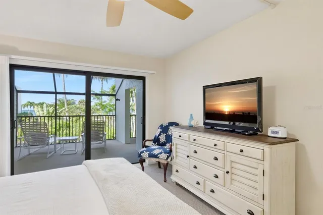 a room with furniture and flat screen tv