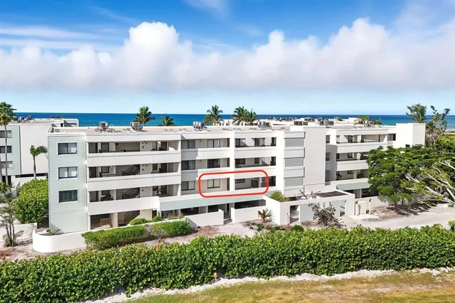 a view of a building with a yard