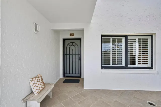 a view of wooden floor and chair in a room