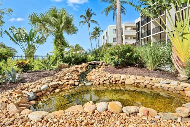 a view of yard with swimming pool