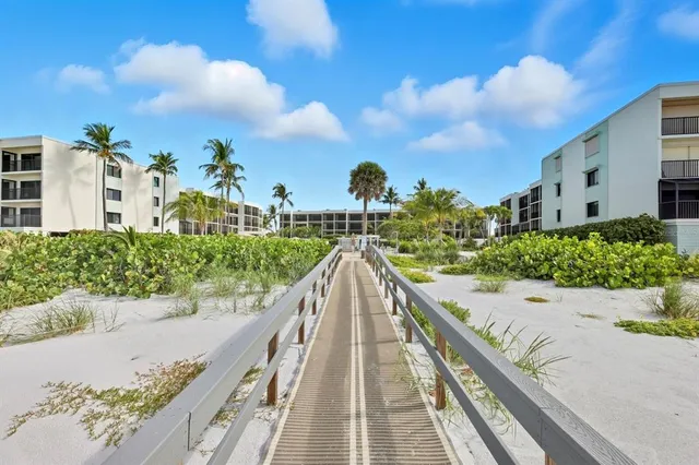 a view of a city with large trees