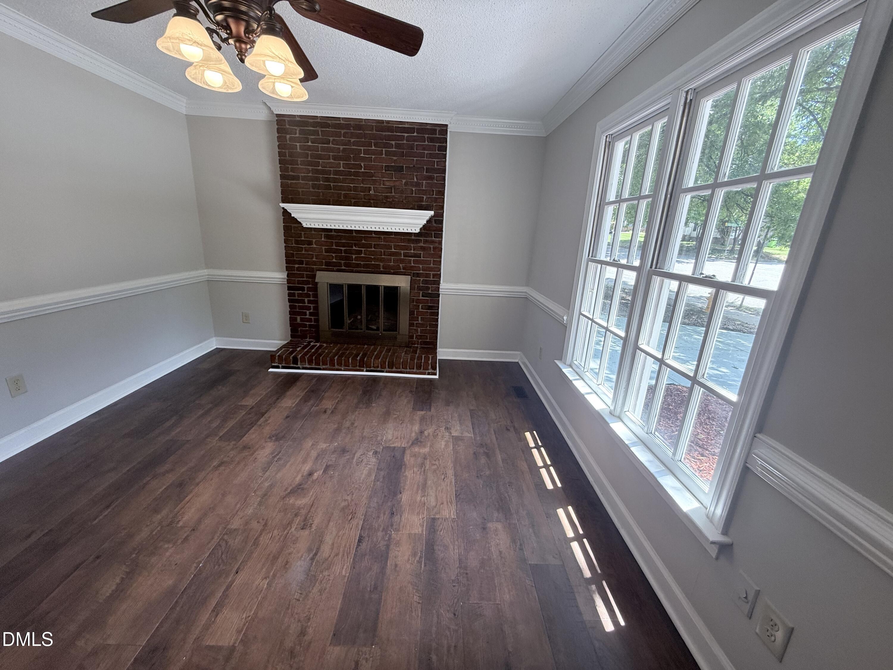 2900 Broadlands Drive Raleigh, NC 27604 - Photo 57 of 60 a view of wooden floor fire place in an empty room