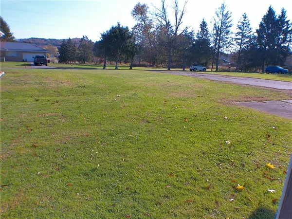 a view of an outdoor space and a yard