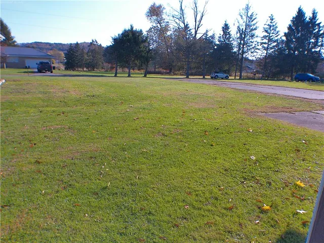 a view of an outdoor space and a yard