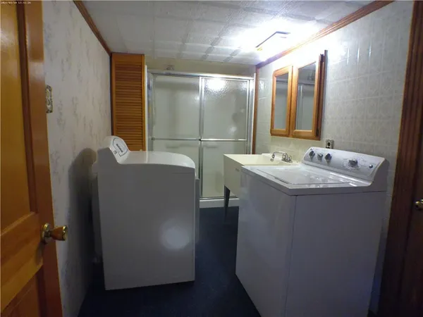 a bathroom with a sink and mirror