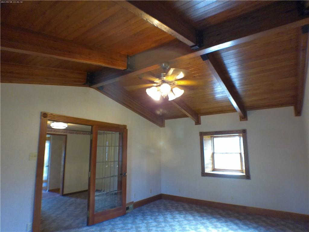 105 Single Street Carmichaels, PA 15320 - Photo 27 of 43 wooden floor in an empty room with a window