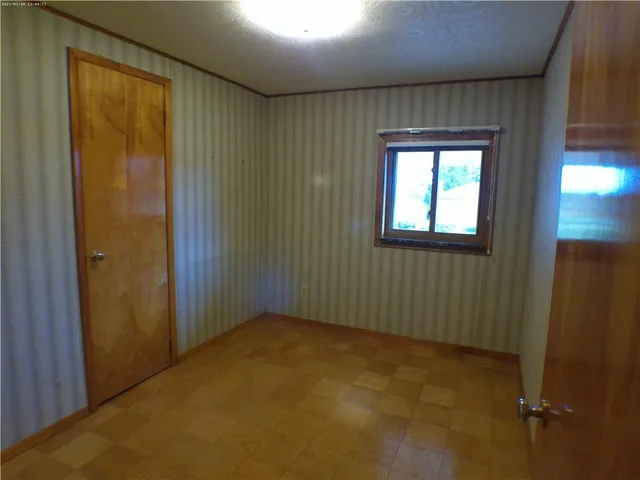 a kitchen with stainless steel appliances a stove and a refrigerator
