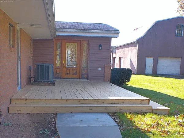 a view of a house with a swimming pool