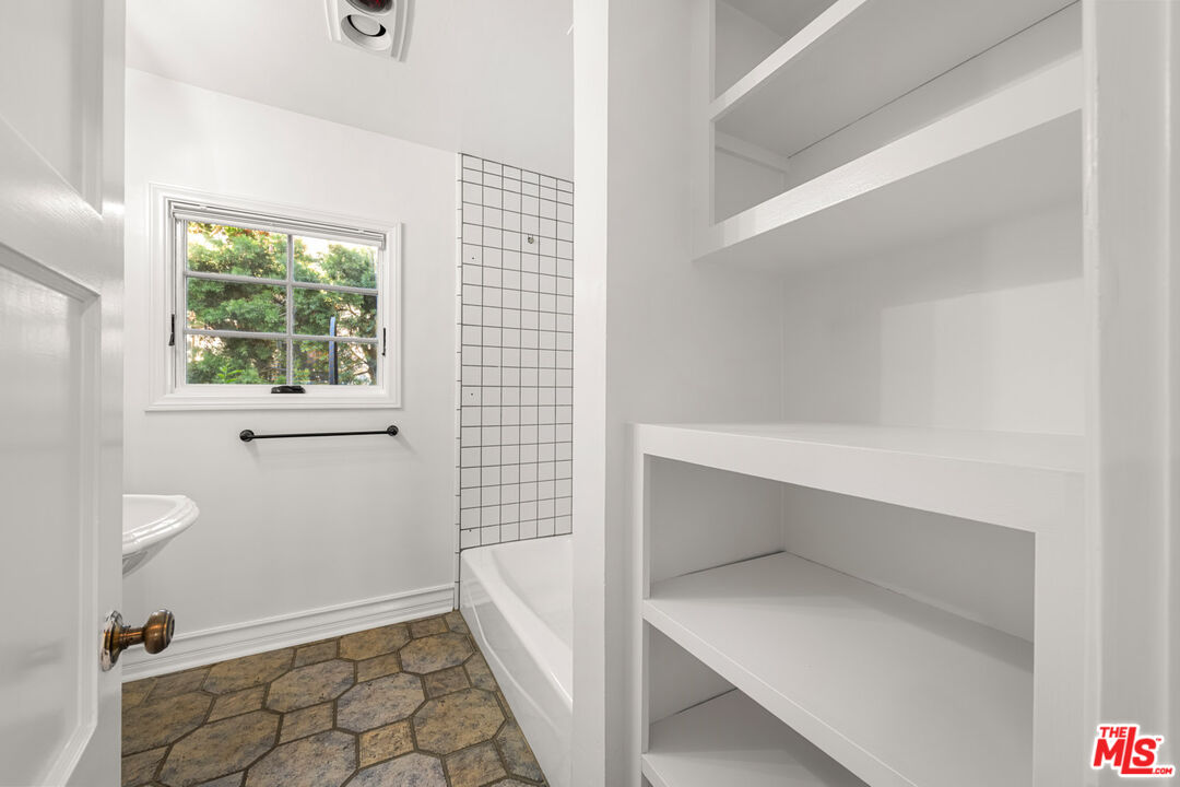 1849 Benecia Avenue Los Angeles, CA 90025 - Photo 17 of 59 a view of an empty room with a window