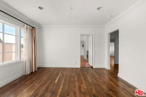 a utility room with sink dryer and washer