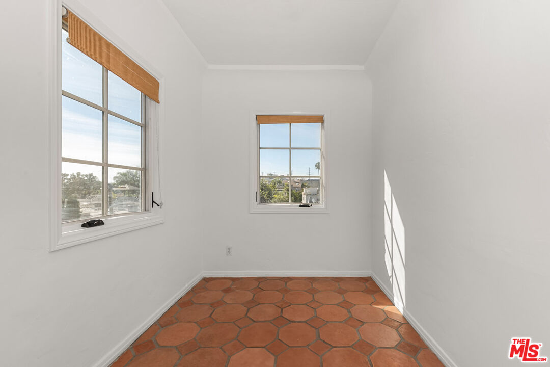 1849 Benecia Avenue Los Angeles, CA 90025 - Photo 42 of 59 an empty room with windows