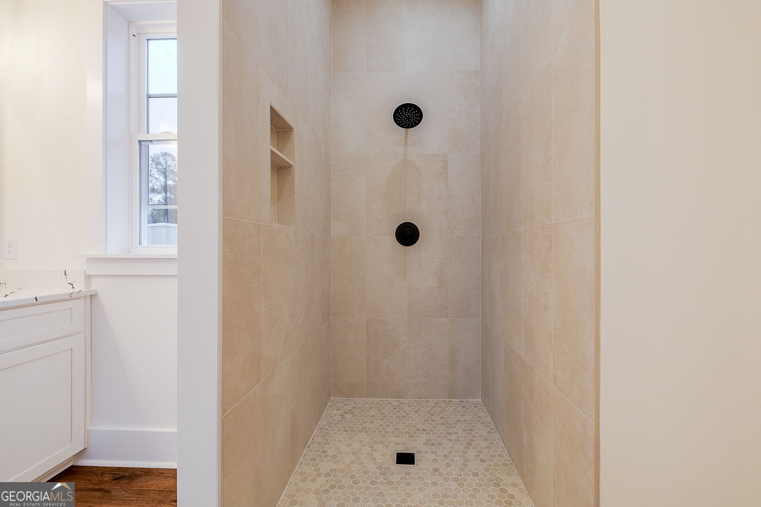 610 Rogers Street Pooler, GA 31322 - Photo 20 of 30 a bathroom with a shower