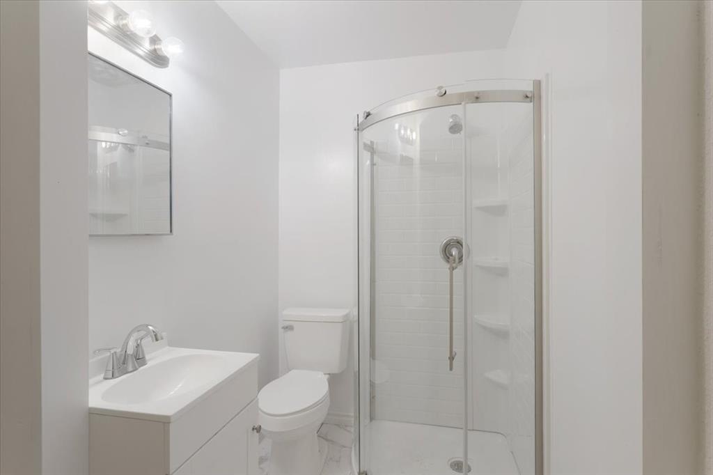 Undisclosed Address Howe, TX 75459 - Photo 21 of 29 a bathroom with a toilet sink shower and mirror