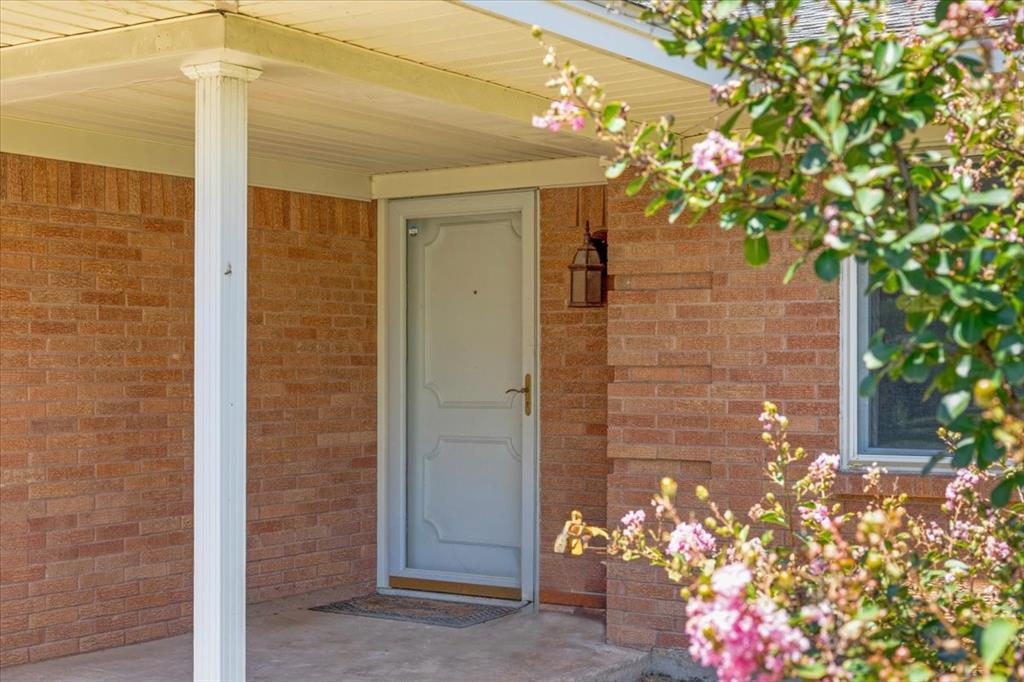 Undisclosed Address Howe, TX 75459 - Photo 24 of 29 a front view of a house with flowers