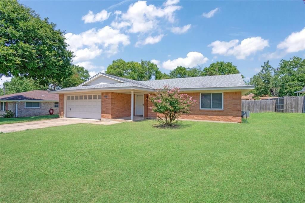 Undisclosed Address Howe, TX 75459 - Photo 3 of 29 a front view of house with yard and green space