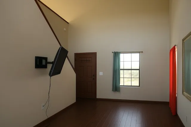 a view of entryway with wooden floor