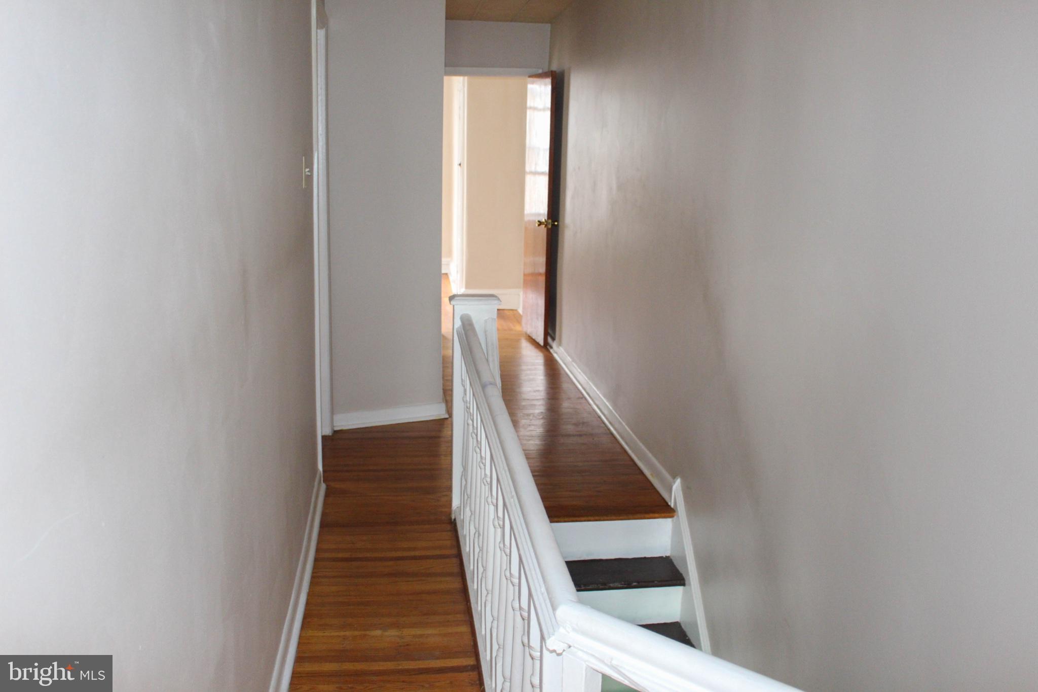 543 North Simpson Street Philadelphia, PA 19151 - Photo 7 of 11 Bright and inviting hallway awaits you.