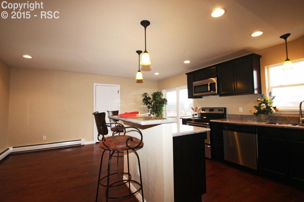 53 Lazy W Road Fountain, CO 80817 - Photo 5 of 31 Kitchen breakfast bar.