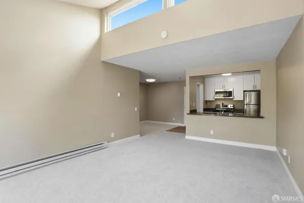 a view of a kitchen with a sink