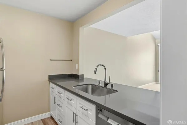 a close view of a sink and a mirror