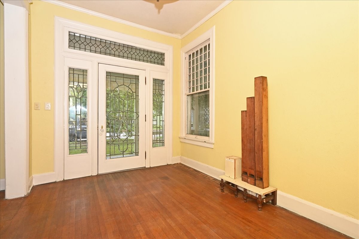 426 Sherman Street Southeast Decatur, AL 35601 - Photo 2 of 41 a view of an empty room with glass door