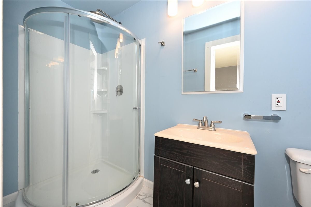 426 Sherman Street Southeast Decatur, AL 35601 - Photo 21 of 41 a bathroom with a sink and mirror