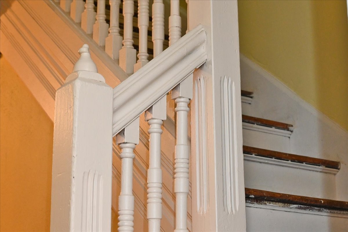 426 Sherman Street Southeast Decatur, AL 35601 - Photo 24 of 41 a view of staircase with railing and white walls